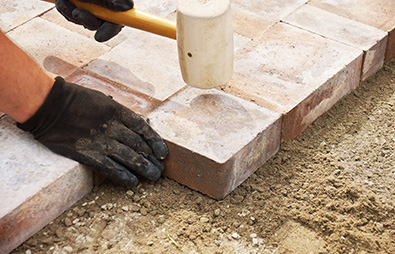 Pavers being carefully installed